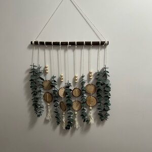 Rustic Wall Hanging with Greenery and Wood Accents